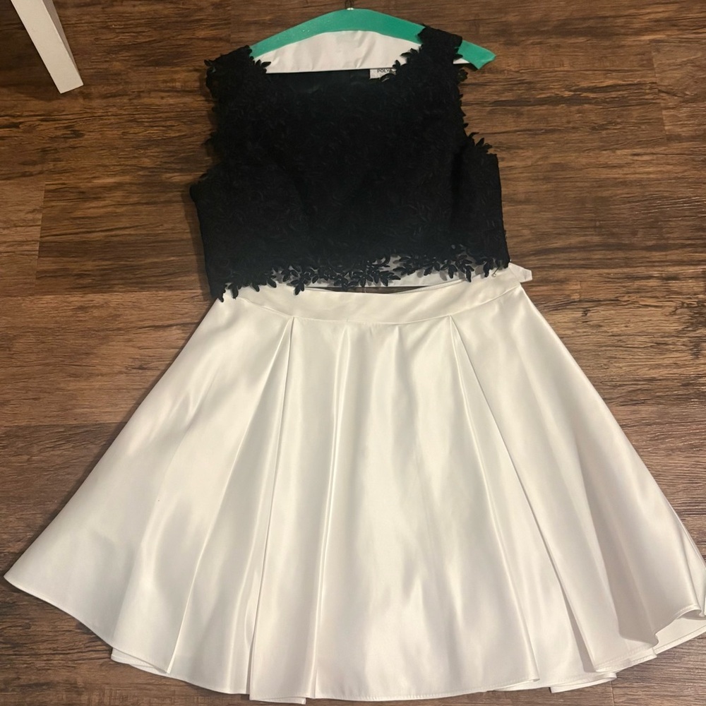 Poly USA by Neblon
Size Large

🪩Black Lace Top and White Skirt Set🪩